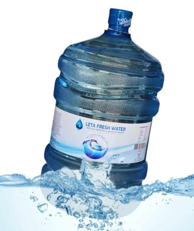 A clear glass being filled with fresh drinking water